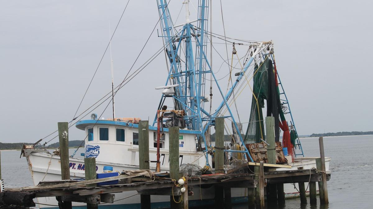 Pier with fishing boat